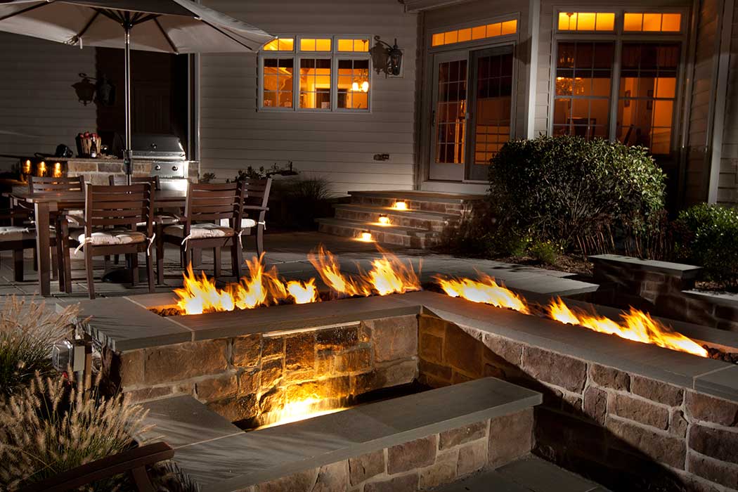 Patio and Outdoor Kitchen with a Fire Wall
