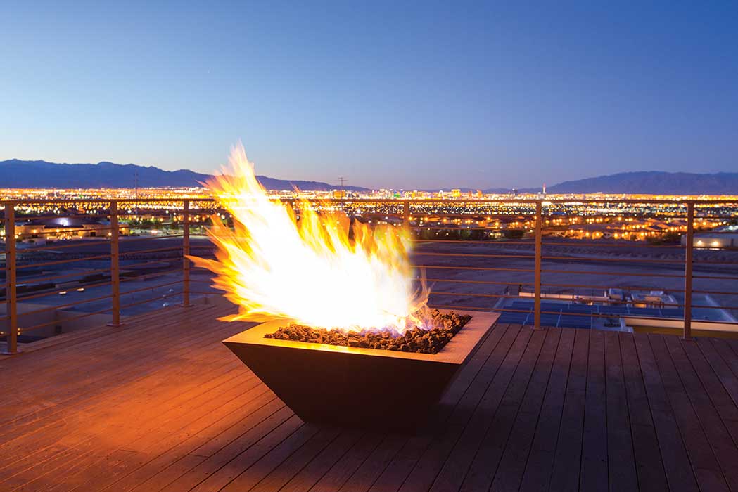 Sedona Copper Fire Pit on a deck