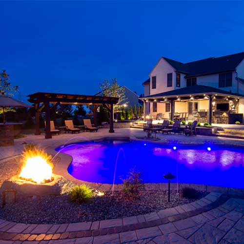 Yard with fire pit and pool