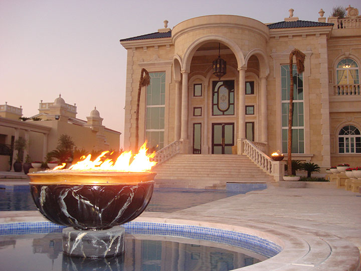 Fire and water feature with a beautiful house